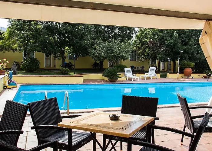 Le Mimose Отель Сан-Теодоро